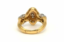 Bague contemporaine en or jaune et blanc 18 carats sertie d'un diamant (0.33ct)