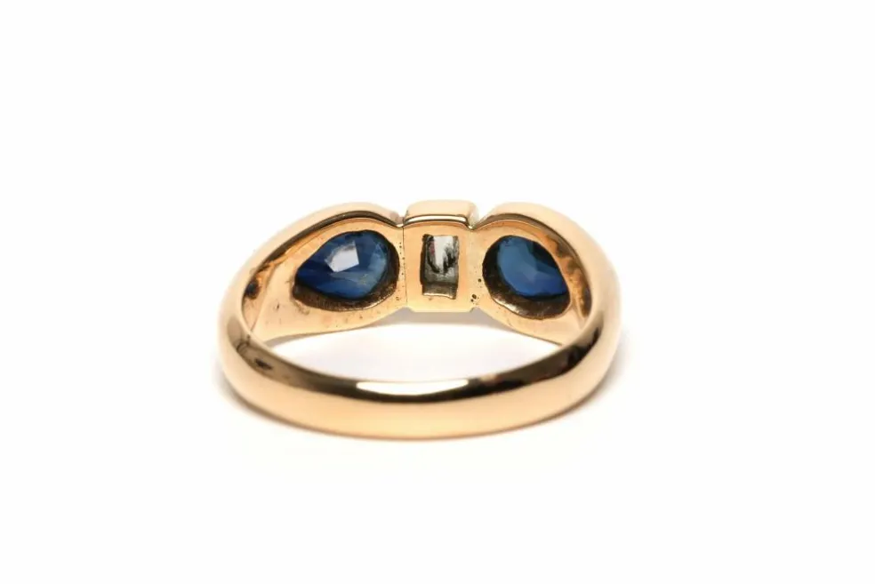 Bague contemporaine en or jaune 18 carats sertie de saphirs et d'un diamant