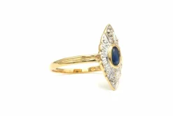 Bague contemporaine en or jaune 18 carats sertie d'un saphir et de diamants