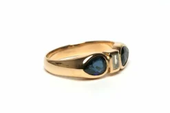 Bague contemporaine en or jaune 18 carats sertie de saphirs et d'un diamant