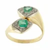 Bague contraire avec émeraudes et diamants