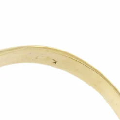 Bague contraire avec émeraudes et diamants