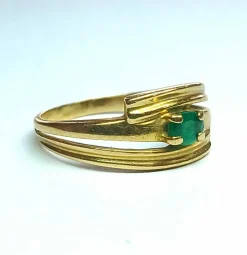 Bague croisée en or jaune et émeraude