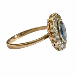 Bague de style Art Déco en or et platine avec diamants et saphir