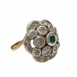Bague design Art Déco en or et argent avec diamants et émeraude