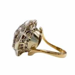 Bague design Art Déco en or et argent avec diamants et émeraude