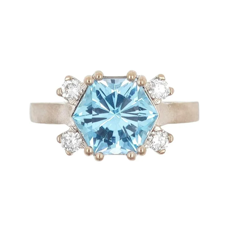 Bague design en or avec topaze bleue et diamants