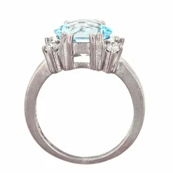 Bague design en or avec topaze bleue et diamants