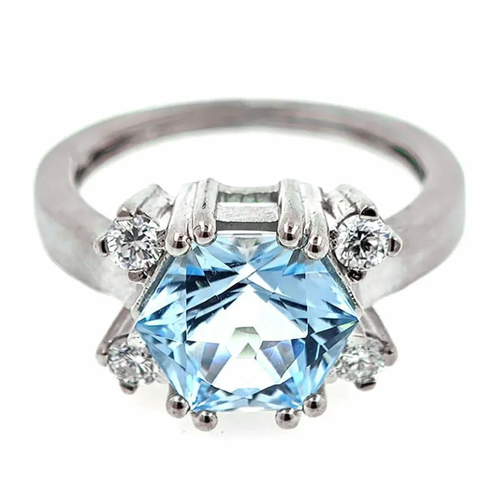 Bague design en or avec topaze bleue et diamants