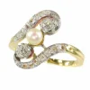 Bague diamant et perle