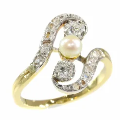 Bague diamant et perle