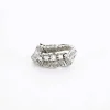 Bague diamants lignes et volutes en or blanc et platine