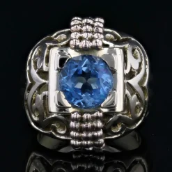 Bague dôme or ajourée et son aigue-marine