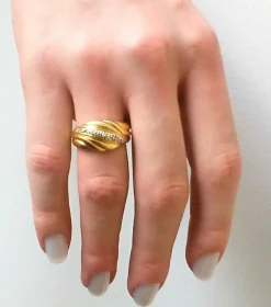 Bague drapé en or jaune, gris et diamants
