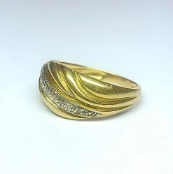 Bague drapé en or jaune, gris et diamants