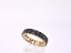 Bague d'éternité en or jaune avec diamants noirs