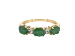 Bague en or avec diamants et émeraude