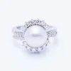 Bague en or avec perle naturelle et diamants