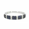 Bague en or blanc avec diamants et saphirs