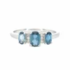 Bague en or blanc avec diamants et topaze