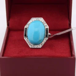 Bague en or blanc avec turquoise et onyx