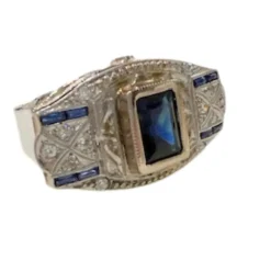 Bague en or et platine de style Art Déco avec diamants et saphirs