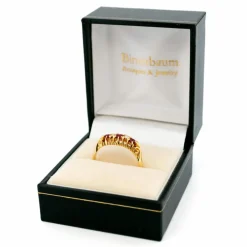 Bague en or jaune avec diamants et rubis