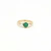 Bague en or jaune avec émeraude et diamants coniques