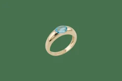 Bague en or jaune avec pierre bleue