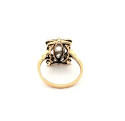 Bague en or jaune et argent avec diamant rose central et diamants latéraux