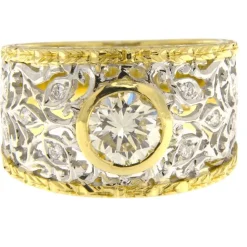 Bague en or jaune et blanc avec diamants taille brillant au centre et sur le pourtour