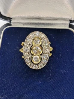 Bague en or jaune et blanc avec ancienne mine et huit huit diamants