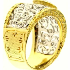 Bague en or jaune et blanc avec diamants taille brillant au centre et sur le pourtour