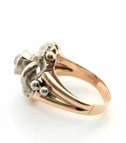 Bague en or jaune et blanc avec diamant central