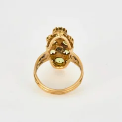 Bague en or jaune et péridots
