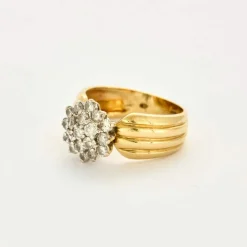 Bague en or jaune, or gris et diamants