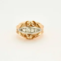Bague en or jaune, or gris et diamants