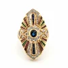 Bague en or jaune ornée de saphirs, de diamants, de rubis et d'émeraudes