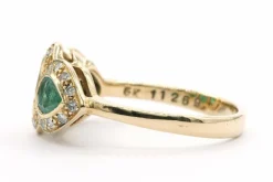 Bague en or jaune sertie d'émeraudes et de diamants
