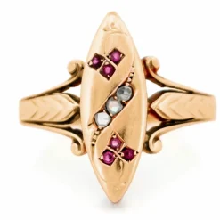 Bague en or rose 14 carats avec diamants et rubis