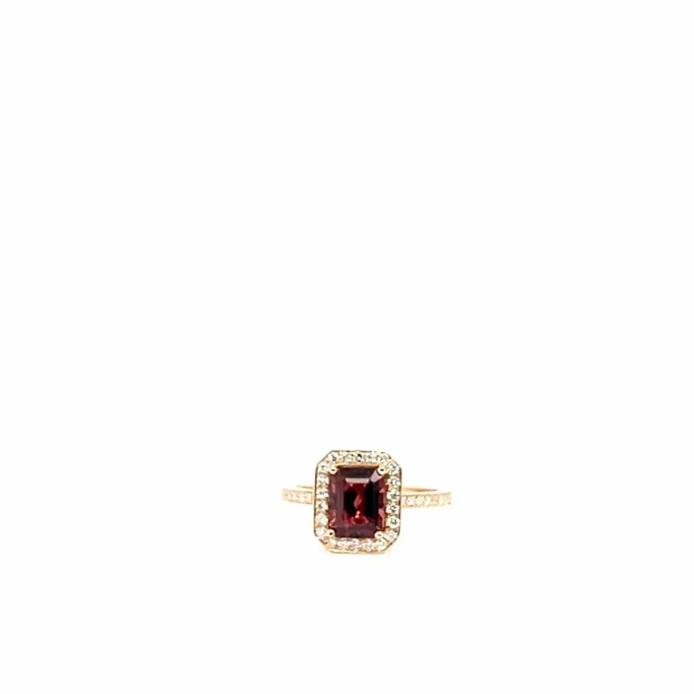 Bague en or rose 18 carats avec tourmaline taille émeraude et pavage de diamants