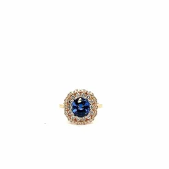 Bague en or rose 18 carats avec saphir bleu de Ceylan taille coussin et diamants