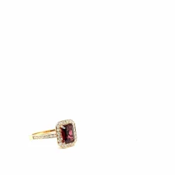 Bague en or rose 18 carats avec tourmaline taille émeraude et pavage de diamants