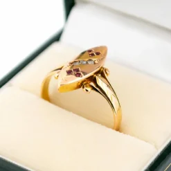 Bague en or rose 14 carats avec diamants et rubis