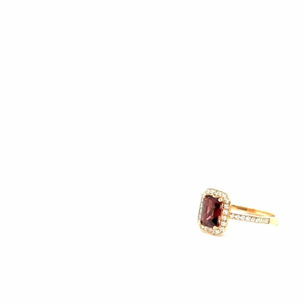 Bague en or rose 18 carats avec tourmaline taille émeraude et pavage de diamants