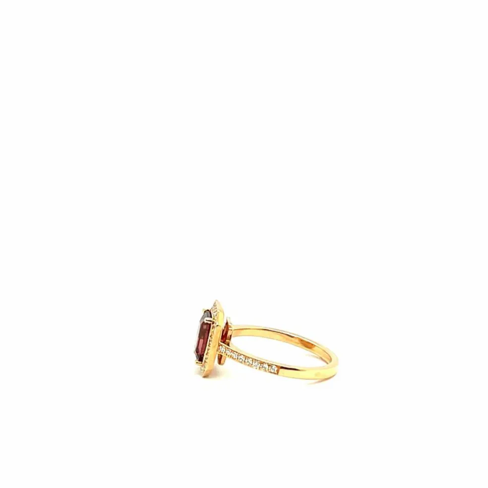 Bague en or rose 18 carats avec tourmaline taille émeraude et pavage de diamants