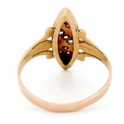 Bague en or rose 14 carats avec diamants et rubis