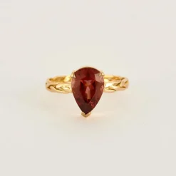 Bague en or rose et grenat