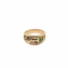 Bague en or sertie de pierres précieuses