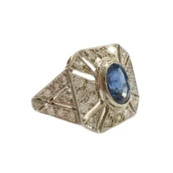 Bague en platine au design Art Déco avec diamants et saphirs